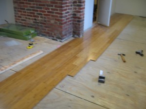 Hardwood floor starts to go down.