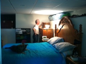 The little standing lamp next to the bed is one of the finds from Vintage on Main. It really works with the limited space because it overhands my one-foot-square bedside table and leaves me room to pile on BOOKS. (And the occasional kitten)